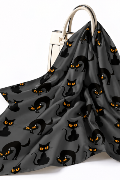 Charcoal Cat Scarf Draped Over Handbag